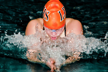 Home schooled student helps finish the girls swim season strong