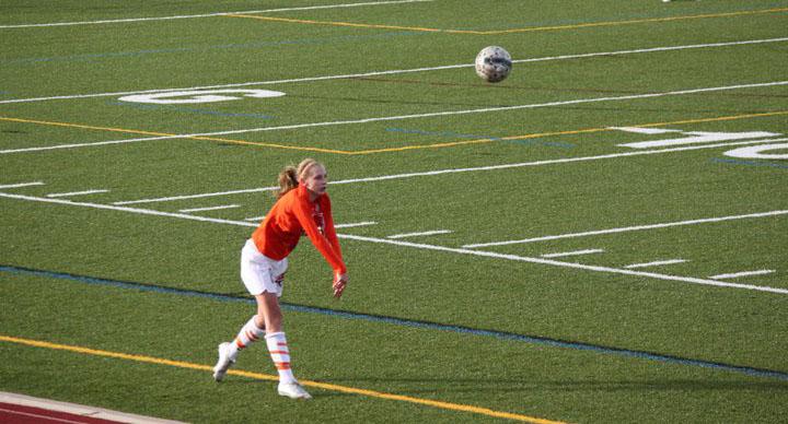 Sophomore Nicole Belisairo takes a throw in for her team. This year the girls’ Varity’s strive and dedication has brought them to great wins in the soccer playoffs.