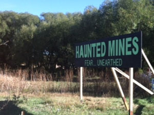 Haunted Mines entrance sign.