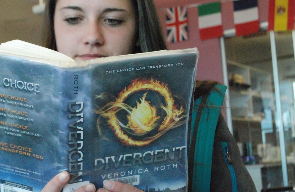 Brenna Oakey enjoys the Sci-Fi novel, Divergent.