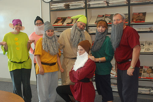 Social Studies teachers dress up for Disney Day during Homecoming Spirit week as the seven dwarfs. 