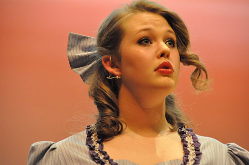 Anna Lincoln, 10, performs her solo at the fall musical, Oklahoma.