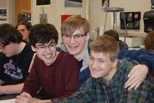 Drew (far left) with two of his friends Tyler Dabbs (middle) and Paul Benendetto (far right)  messing around in Chemistry class. 