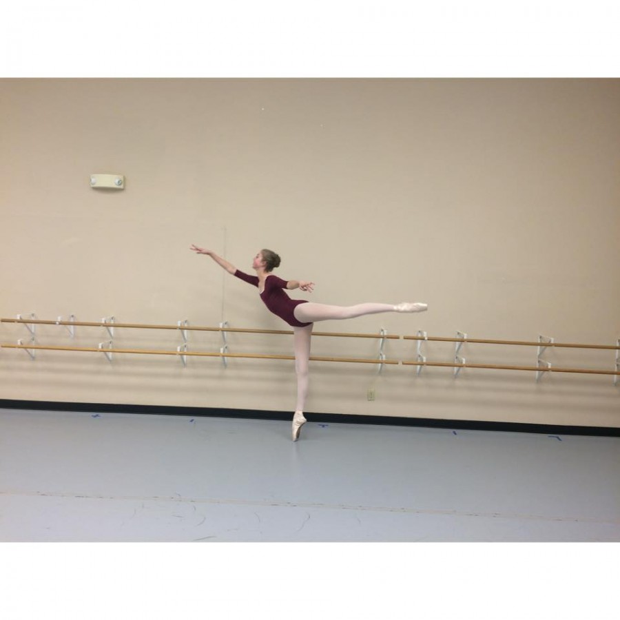 Darcy Luebbert, dancing her heart out with this graceful dance position. 