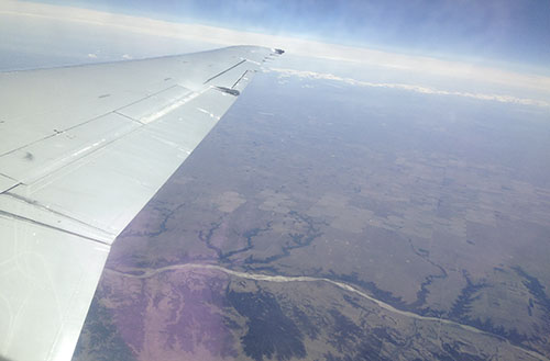 The students fly over Colorado on a Delta airplane on its way to the twin cities in Minnesota