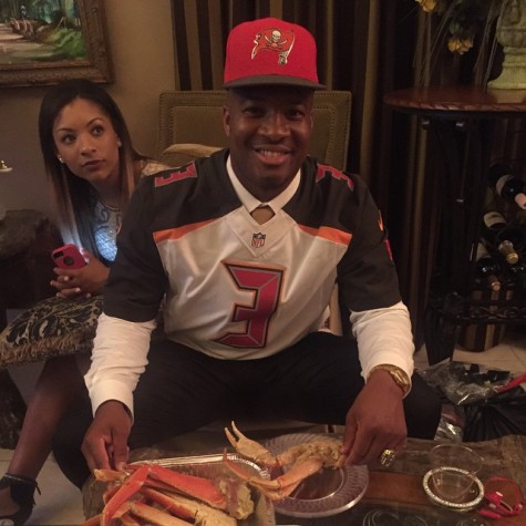 James enjoying crab legs after being selected by the Bucs.
