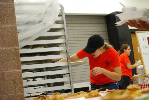 Catherine Best, 12, serves pie to the donors who attended the Empty Bowl dinner.