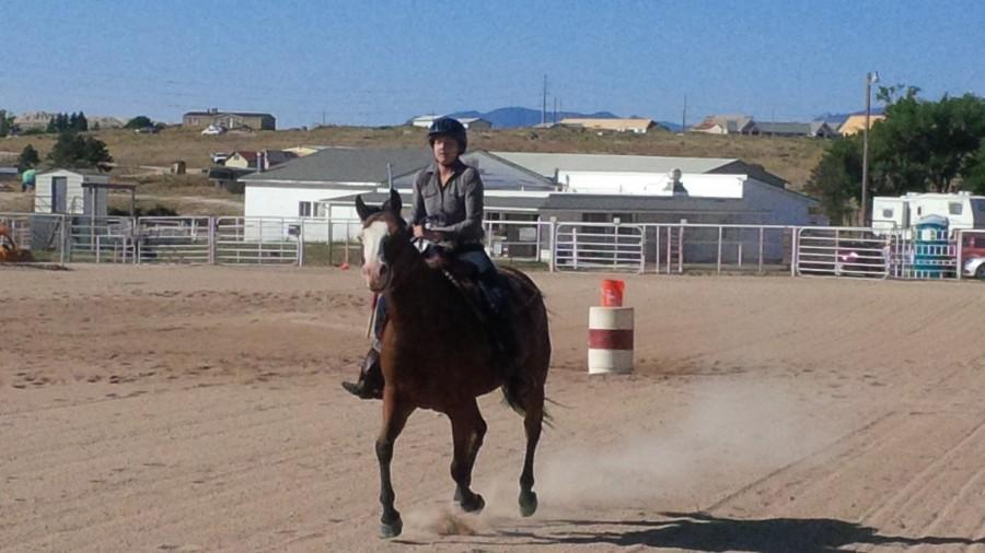 Emma Grothe rides in the flags portion of the competition