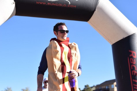 A man runs as a hot dog to take part in the festive Halloween 5K.