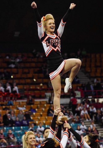 Lewis pulling a lib in a stunt during the team's state performance last year.