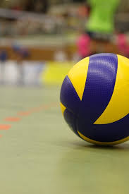 ( Picture by TaniaVdB Creative Commons.com) A volleyball sits on the court before the start of the game. 