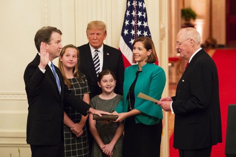 President Trump looks on as retired Associate Justice of the Supreme Court Anthony M. Kennedy swears in Brett Kavanaugh. He was sworn in on October 6th. 