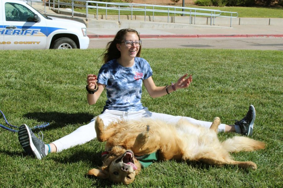 Smagner shares a smile with her dog, Scout, while taking him outside to release some energy.  “I knew he was going to be my best friend and my partner, ever since he was a puppy,” Smagner said.
