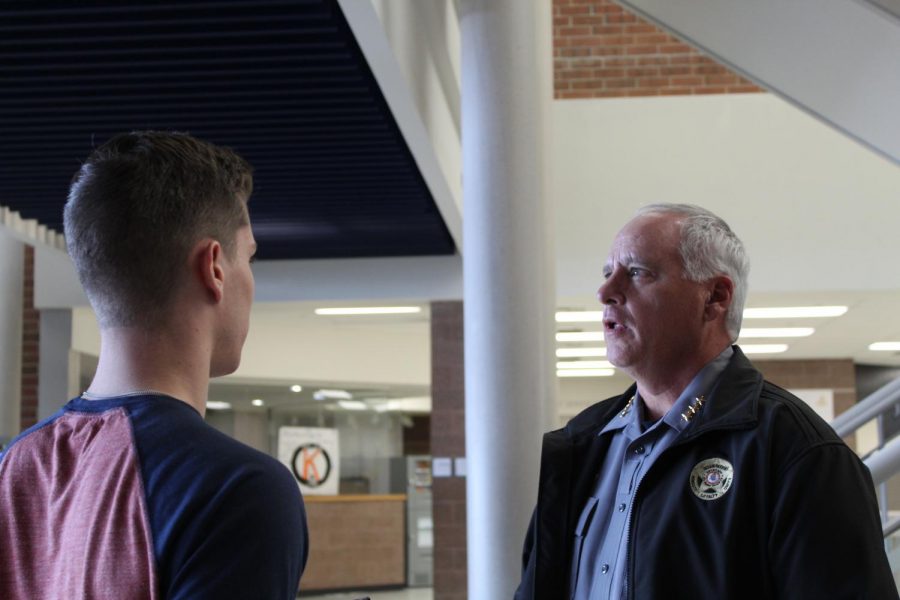 Undersheriff Carey talks to a student on First Responders Appreciation day. As a police officer, it isn’t my job to tell you what is the right decision. I just need to make the information available, Carey said.