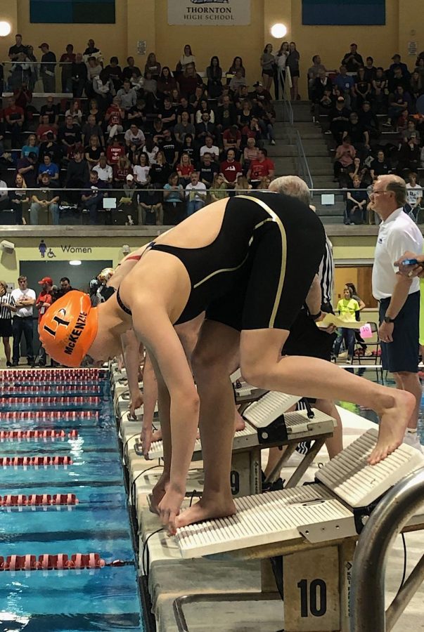Sydney McKenzie 10 takes her mark on the block to start her 200 m IM in B finals, “I thought everyone really stepped up at state.”  McKenzie finished 16th in the 200 m IM.
