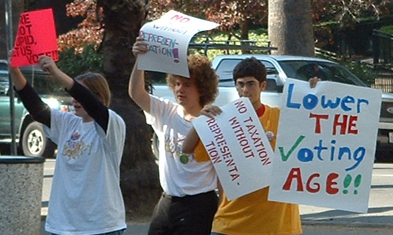 File:NYRA Berkeley voting age protest.jpg by National Youth Rights Association is licensed with CC BY-SA 3.0. 