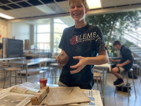 Ethan Hans in ceramics class, makes a clay statue that reminds him of his grandpa’s life lessons. 