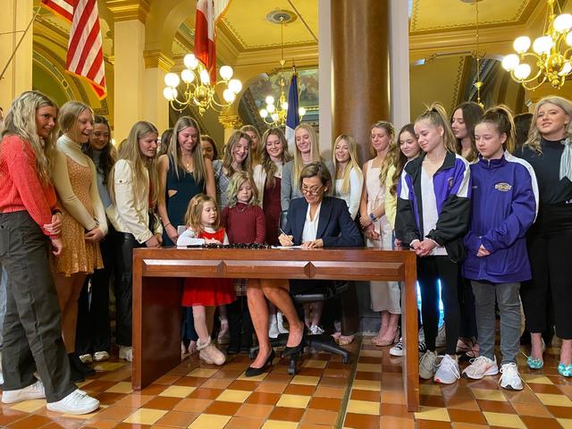 Governor Kim Reynolds signs an anti-trans rights bill in Iowa on March 3,2022. This law is effective immediately which may result in trans female athletes to stop playing in their sports. 