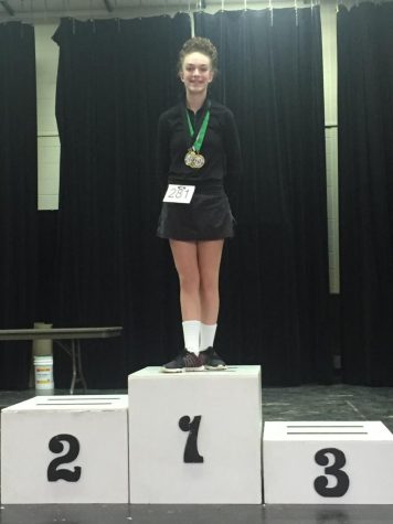 Sydney Tahmindjis 10 receives first place in an Irish Step Dancing Competition in 2018. She no longer competes as a dancer, and instead focuses her time on the JV softball team.